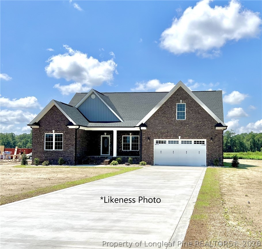1102 West Carthage Road Lumberton, NC 28360 - Photo 40 of 41 a front view of a house with a yard