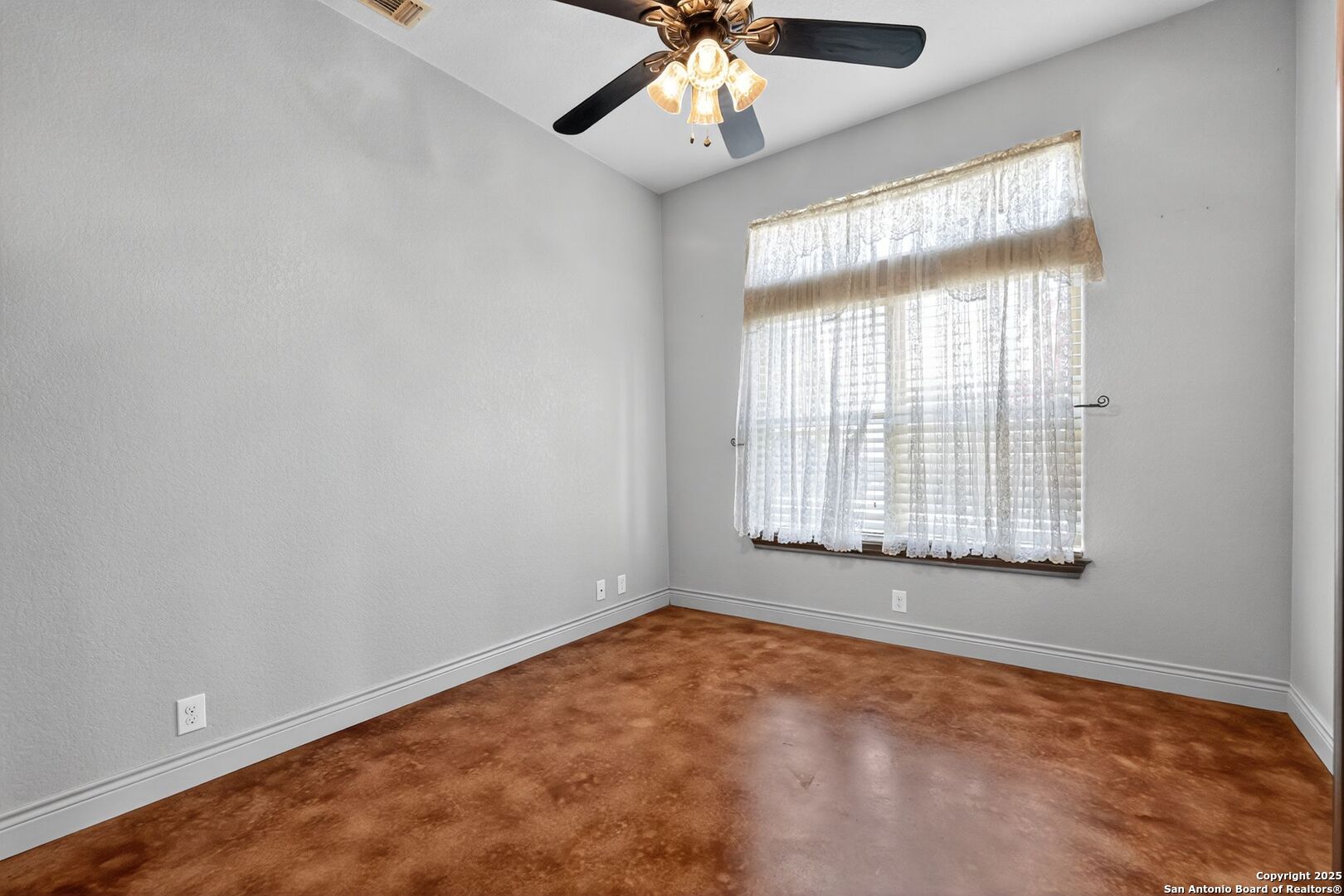 101 Lucky Bandera, TX 78003 - Photo 18 of 42 a view of an empty room with a window