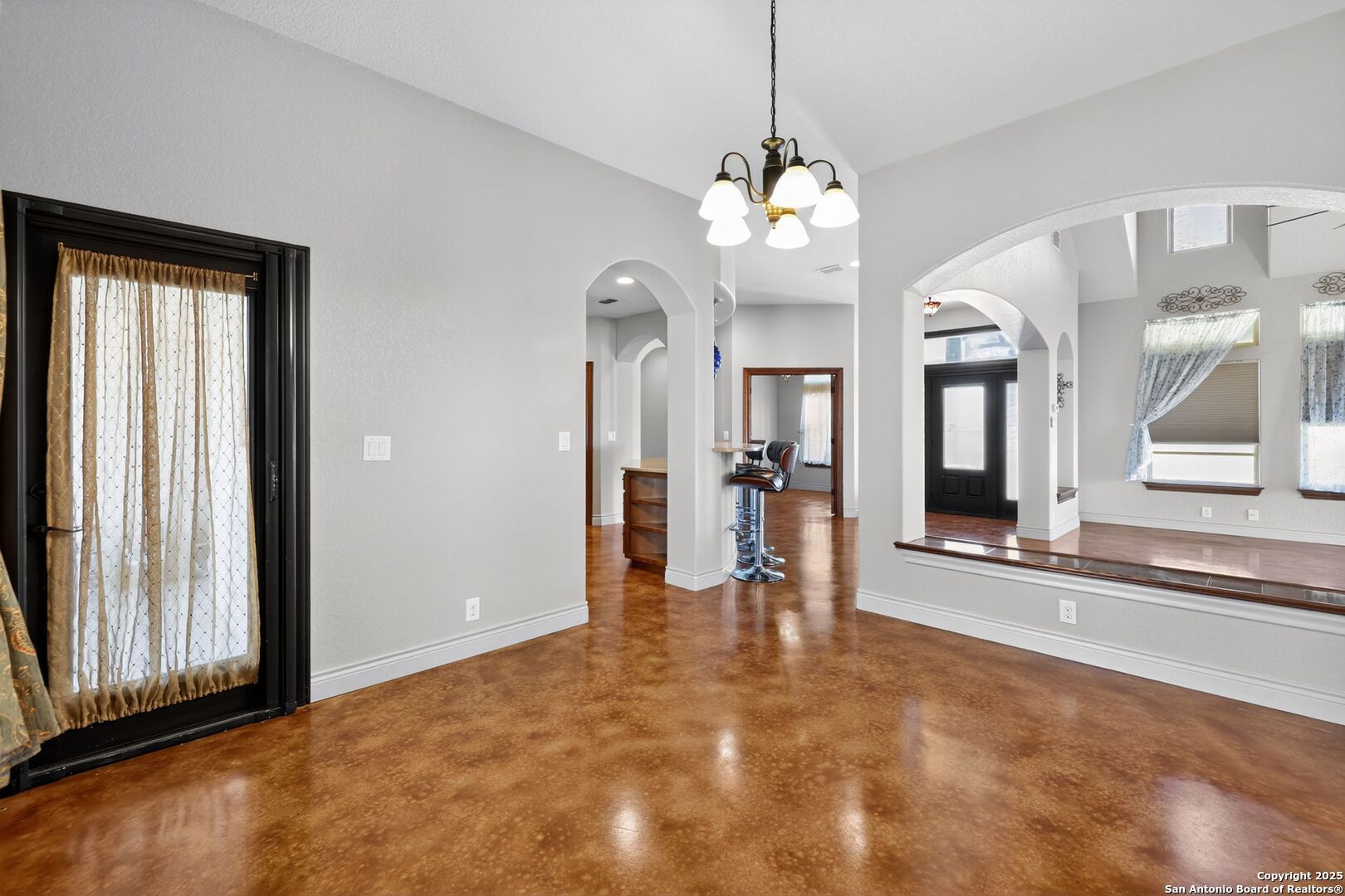101 Lucky Bandera, TX 78003 - Photo 20 of 42 a view of a big room with chandelier windows and a chandelier