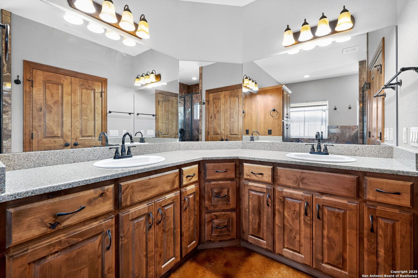 101 Lucky Bandera, TX 78003 - Photo 26 of 42 a kitchen with sink cabinets and a large window