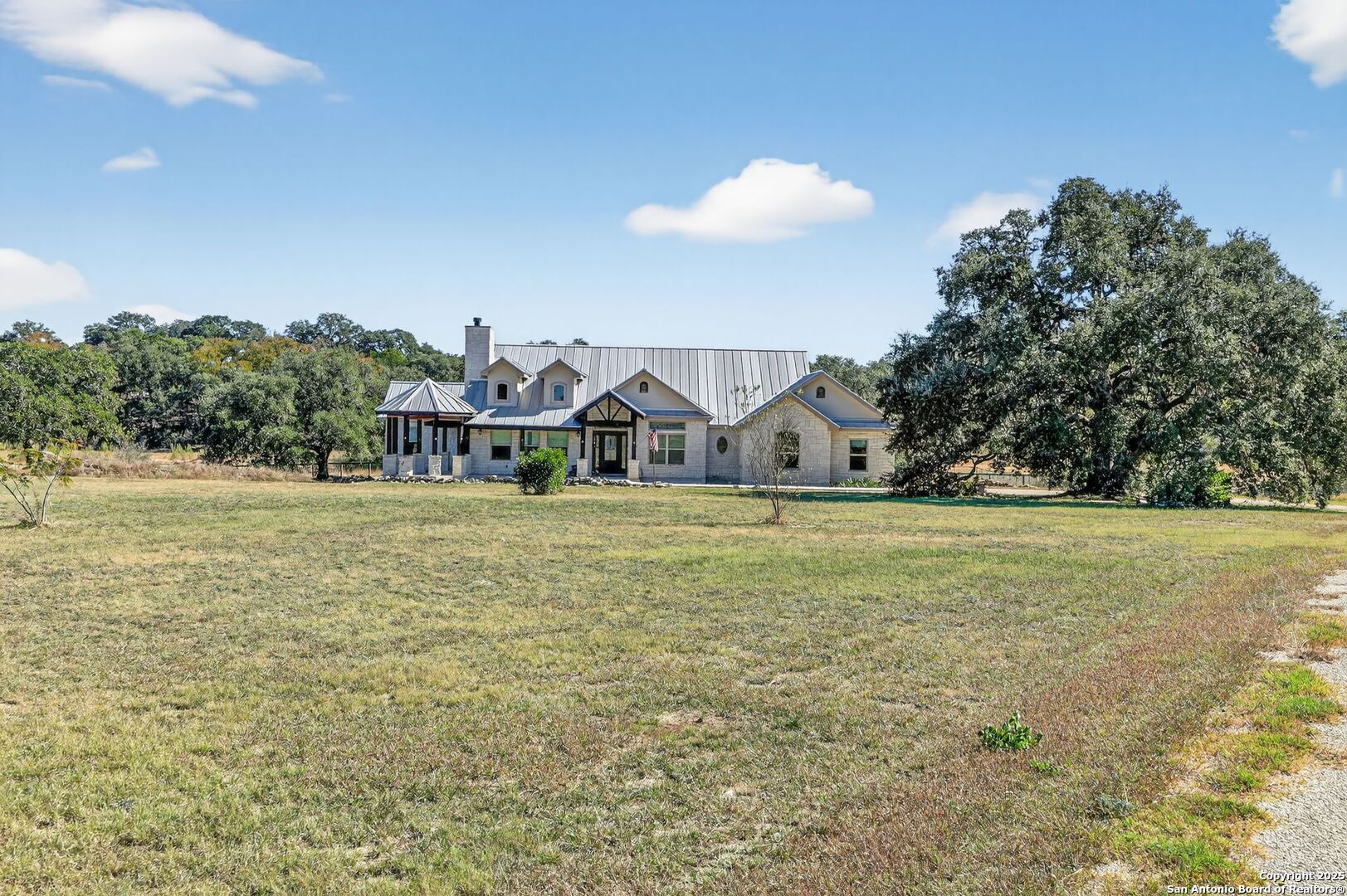 101 Lucky Bandera, TX 78003 - Photo 27 of 42 a view of house with outdoor space and sitting area