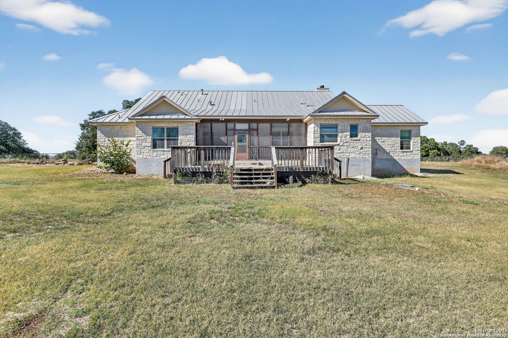 101 Lucky Bandera, TX 78003 - Photo 28 of 42 a front view of a house with a yard