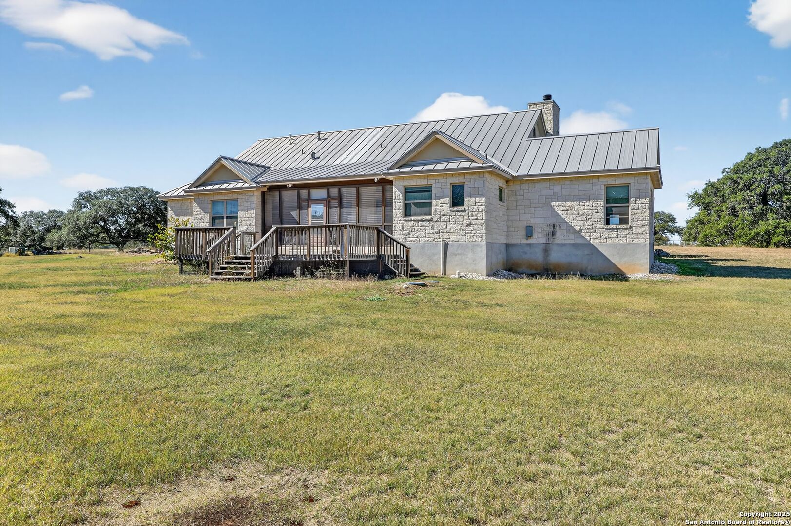 101 Lucky Bandera, TX 78003 - Photo 29 of 42 a front view of a house with a yard