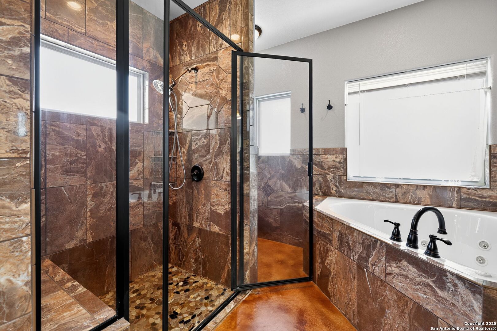 101 Lucky Bandera, TX 78003 - Photo 31 of 42 a bathroom with a bathtub and a shower