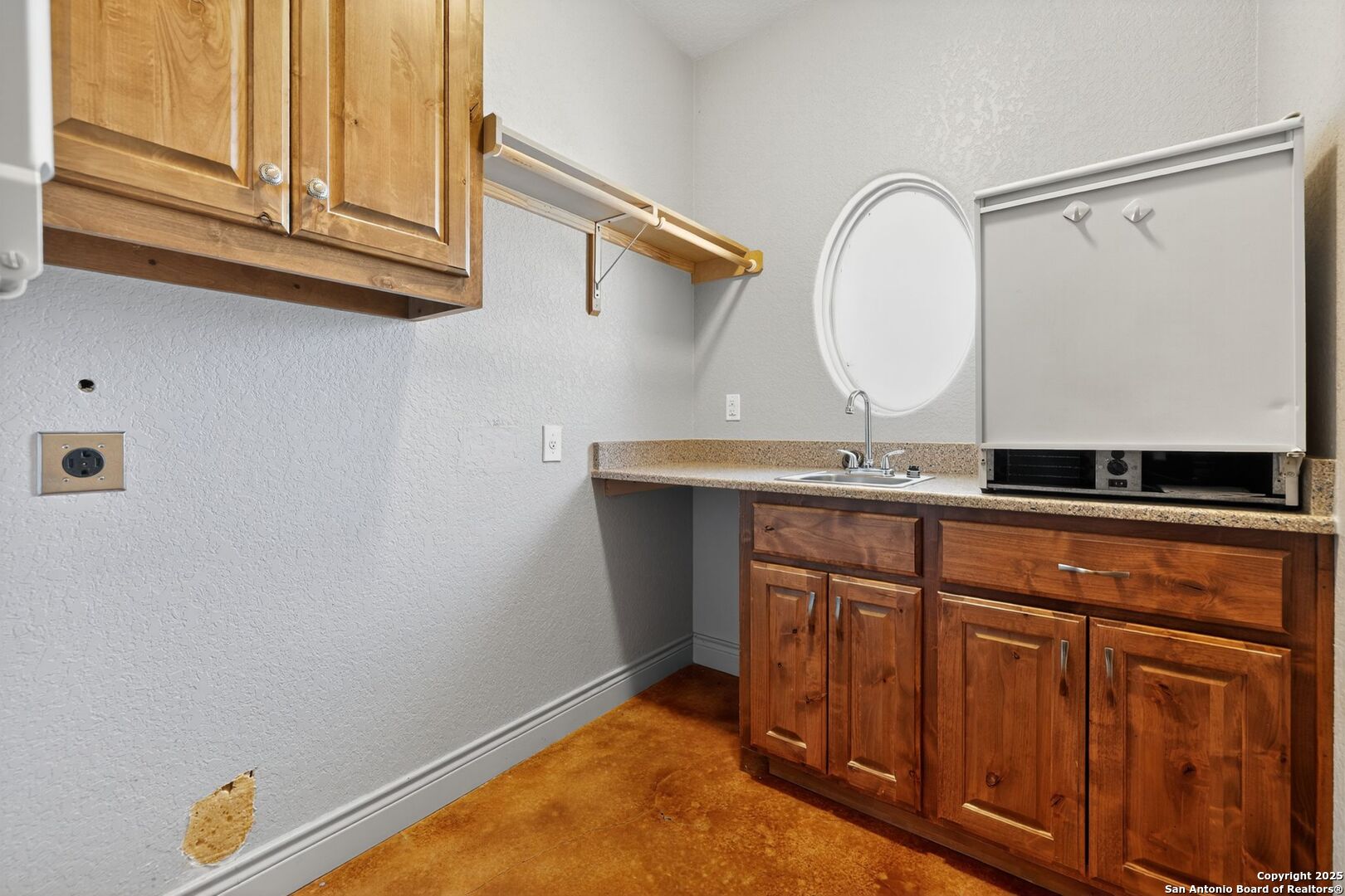 101 Lucky Bandera, TX 78003 - Photo 34 of 42 a bathroom with a sink and a mirror