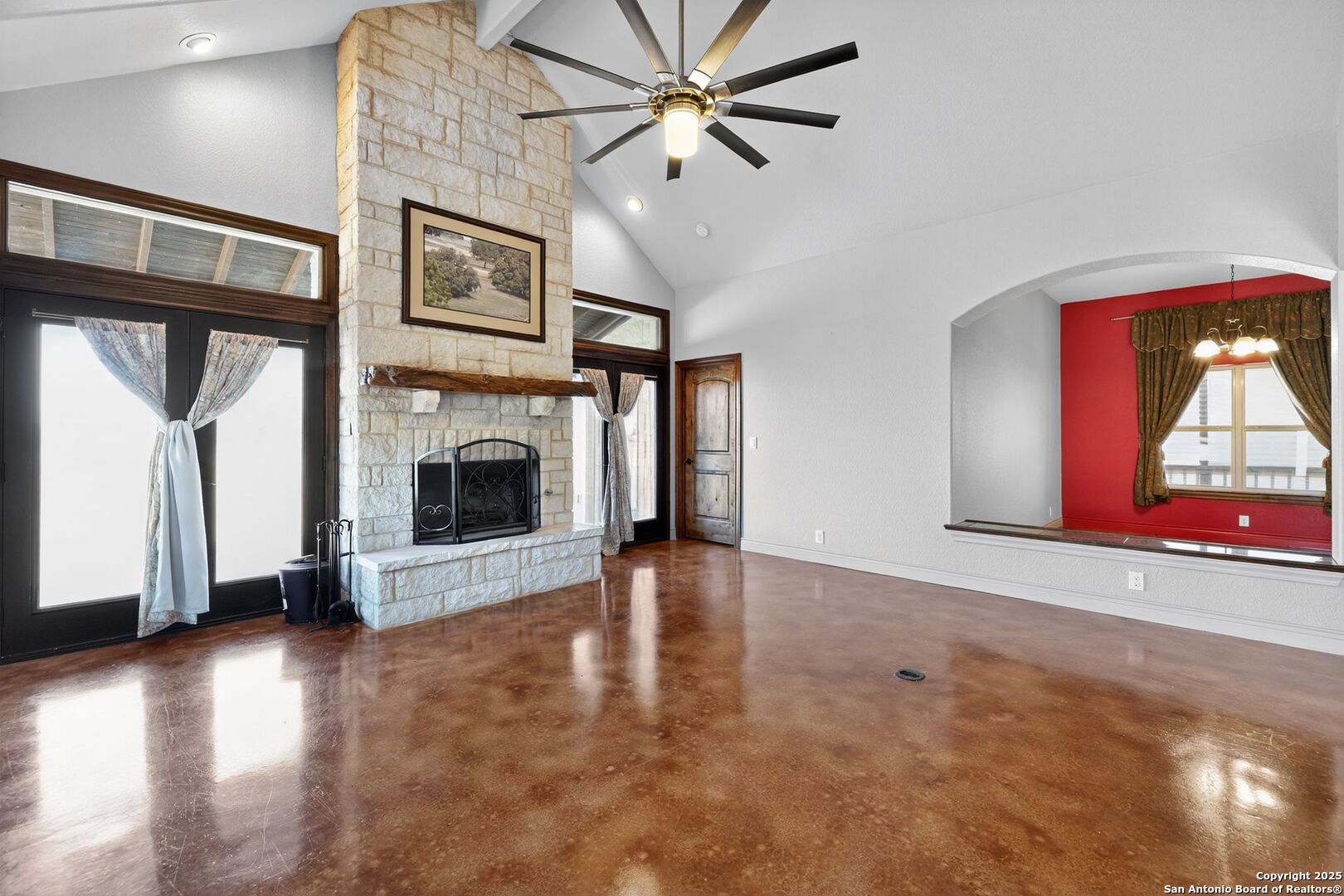 101 Lucky Bandera, TX 78003 - Photo 10 of 42 a view of an empty room with window and fireplace