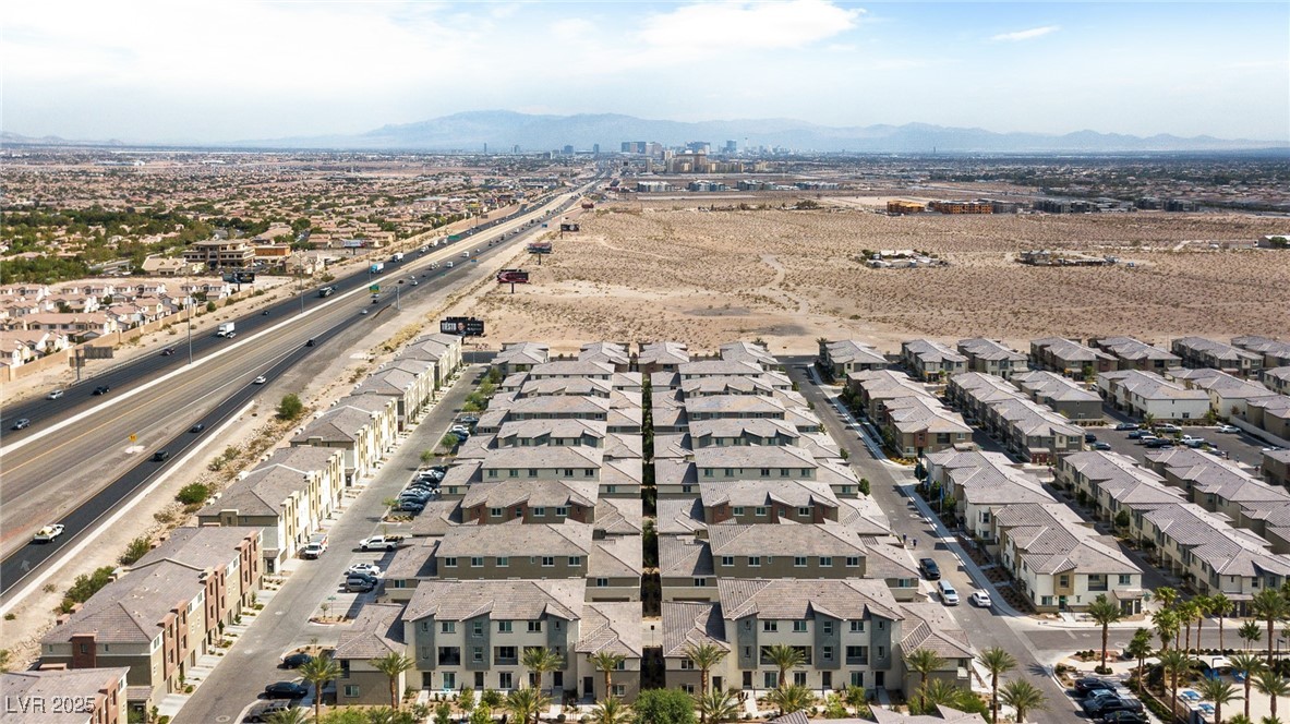 12126 Azure Gate Road, Unit 1 Las Vegas, NV 89183 - Photo 31 of 36 Drone / aerial view with a mountain view