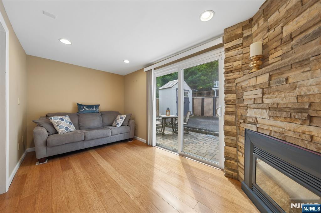 562 Valley Road Clifton, NJ 07013 - Photo 18 of 35 a living room with furniture and a fireplace
