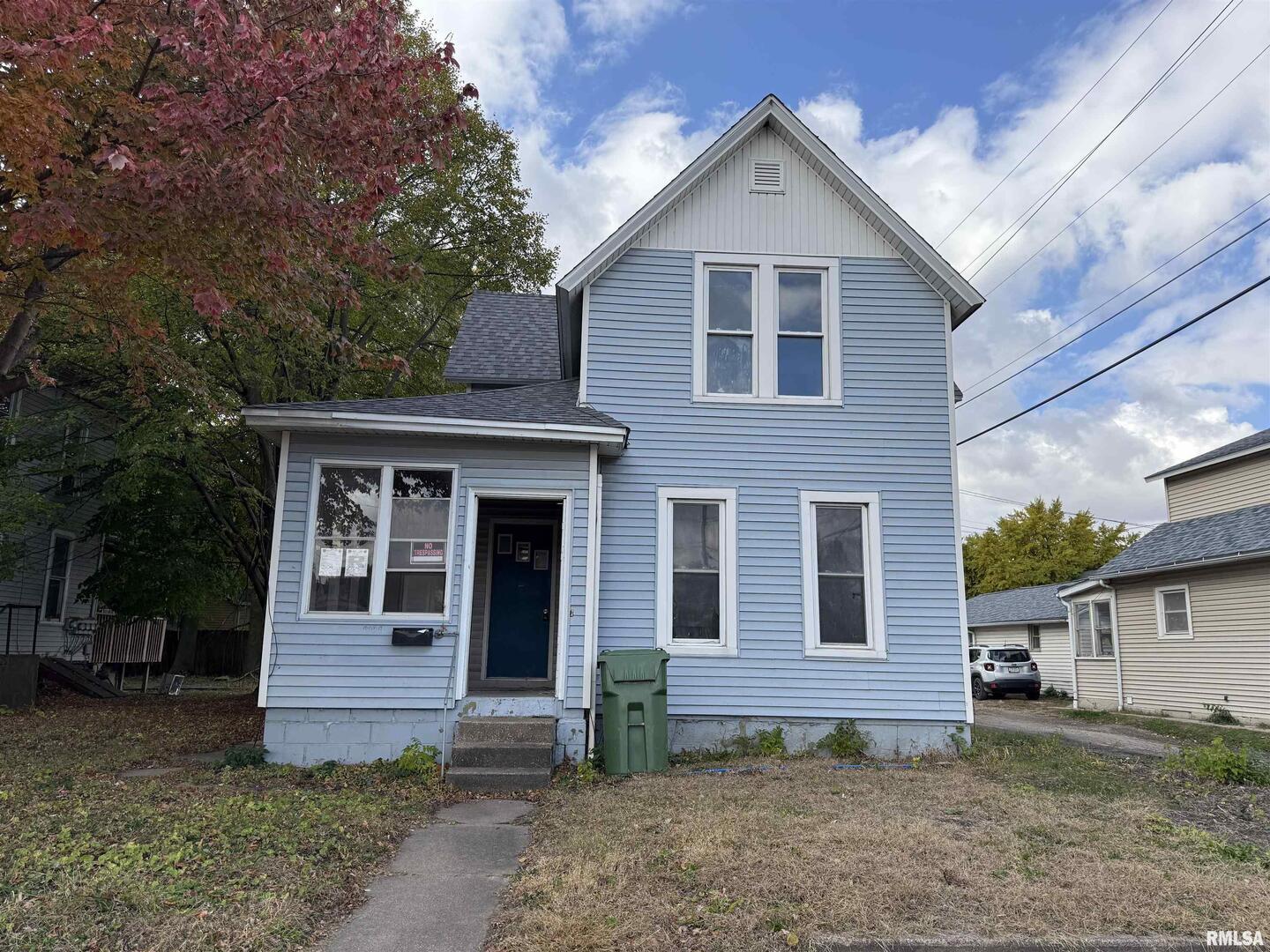 2104 Pershing Boulevard Clinton, IA 52732 - Photo 1 of 14 a front view of a house with garden