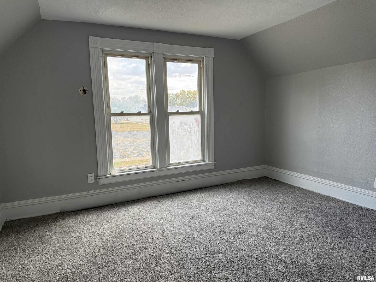 2104 Pershing Boulevard Clinton, IA 52732 - Photo 14 of 14 an empty room with a window