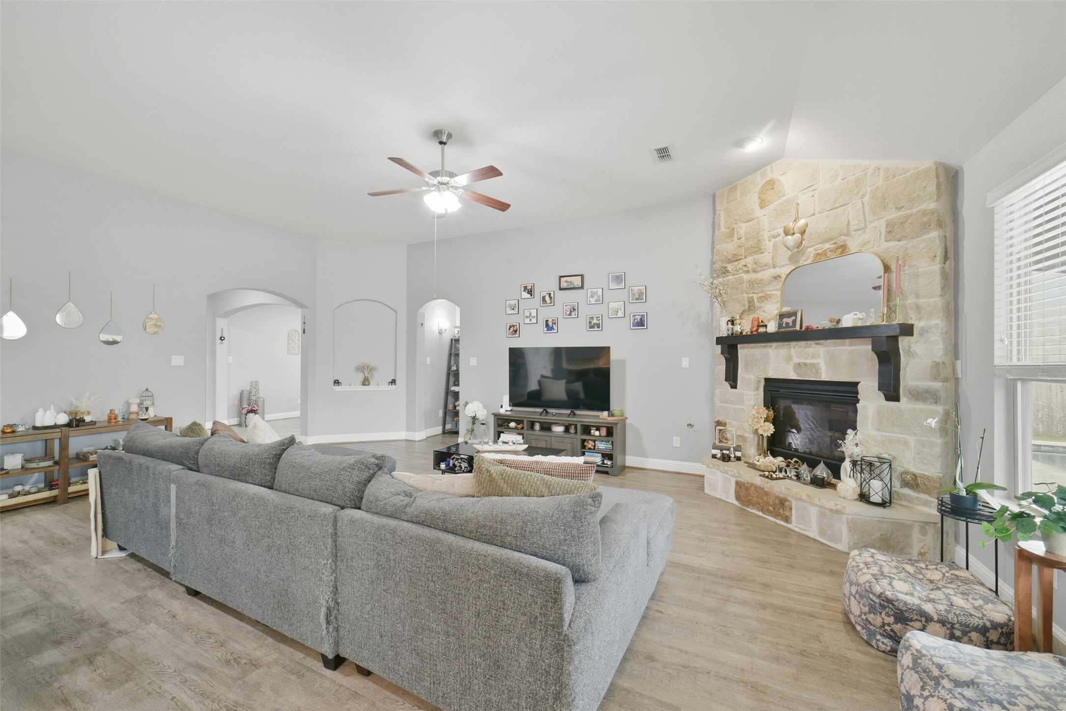30014 Valley Terrace Drive Fulshear, TX 77406 - Photo 12 of 36 From this angle of the family room you can see there is a lot of space for various furniture placement ideas.