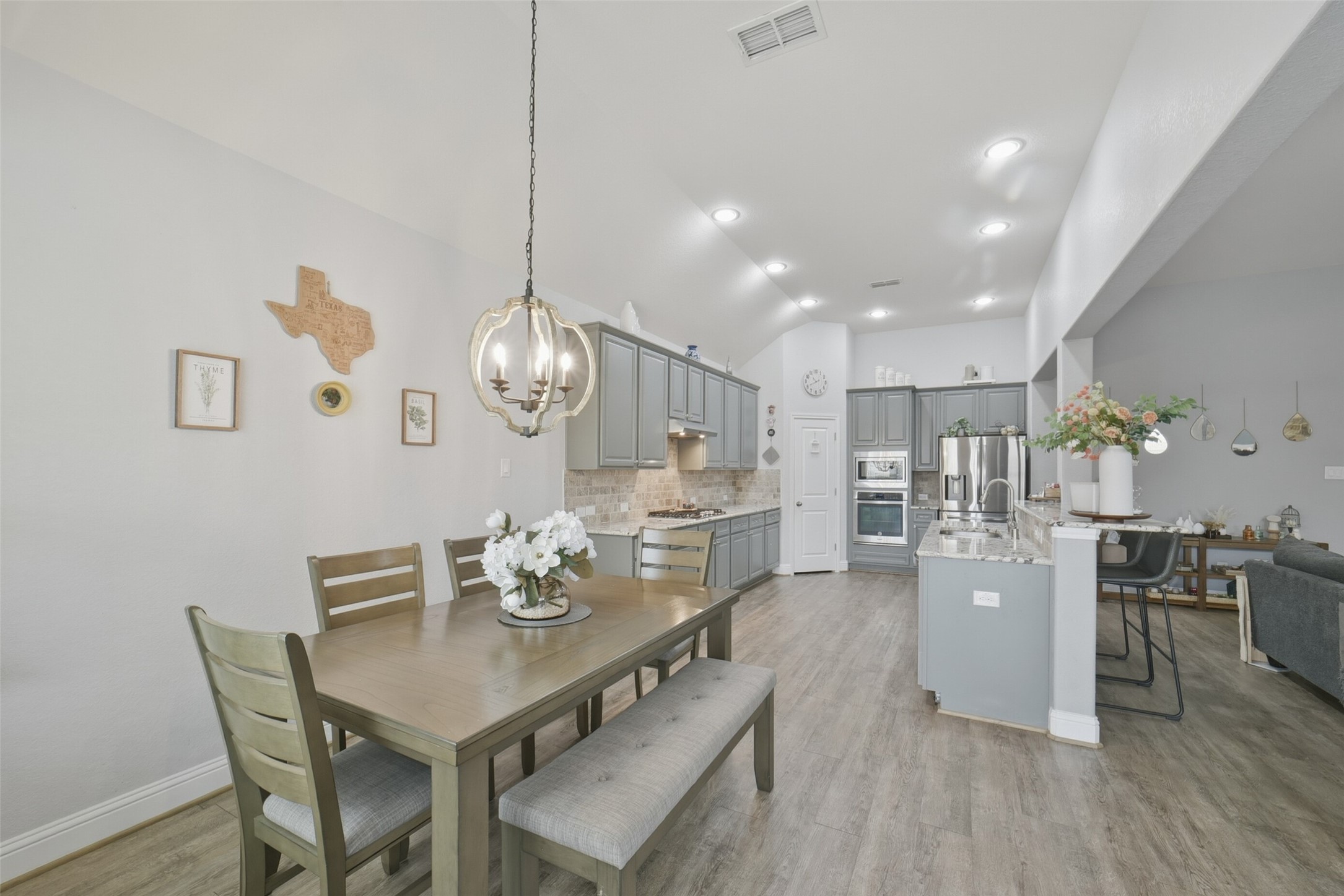 30014 Valley Terrace Drive Fulshear, TX 77406 - Photo 14 of 36 A view from the breakfast nook looking towards the island kitchen.