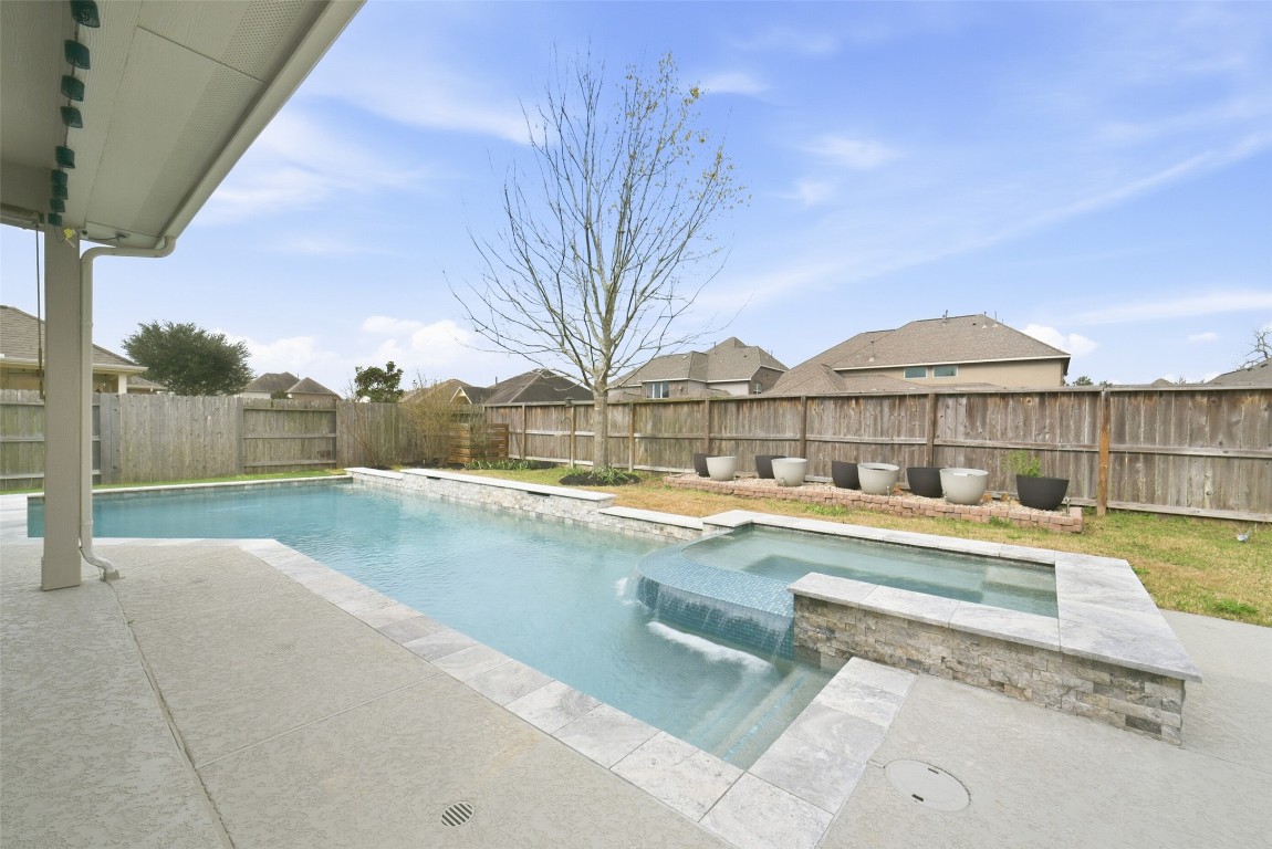 30014 Valley Terrace Drive Fulshear, TX 77406 - Photo 2 of 35 a view of house with outdoor space and swimming pool