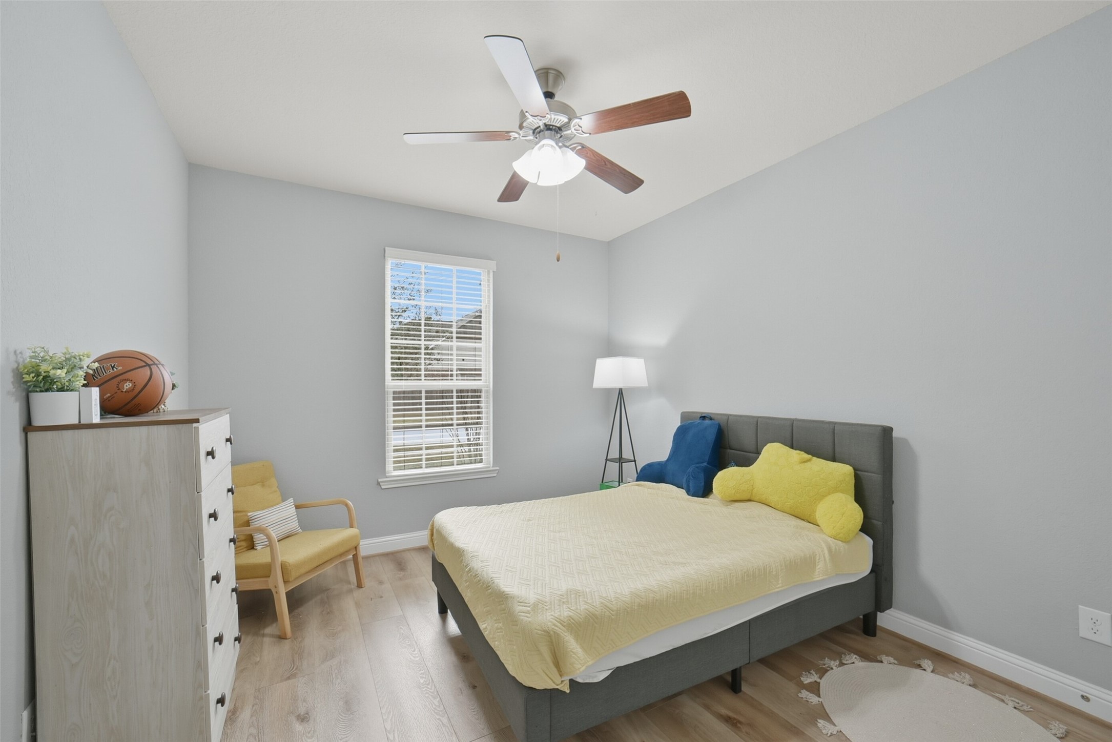 30014 Valley Terrace Drive Fulshear, TX 77406 - Photo 29 of 36 Bedroom #3 has laminate floors and a ceiling fan.