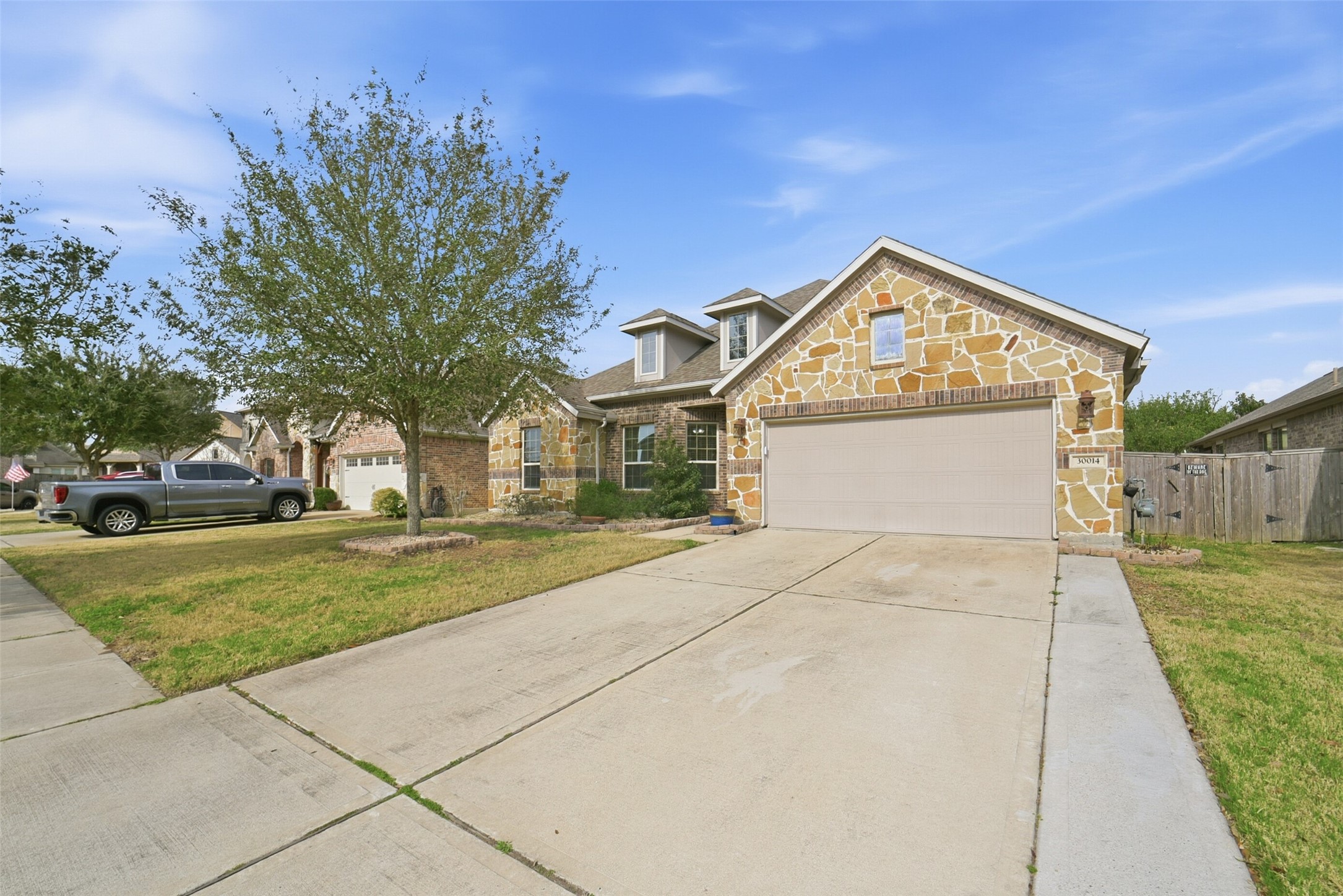 30014 Valley Terrace Drive Fulshear, TX 77406 - Photo 3 of 36 There is a double wide driveway, 2 car attached garage and auto garage door opener.
