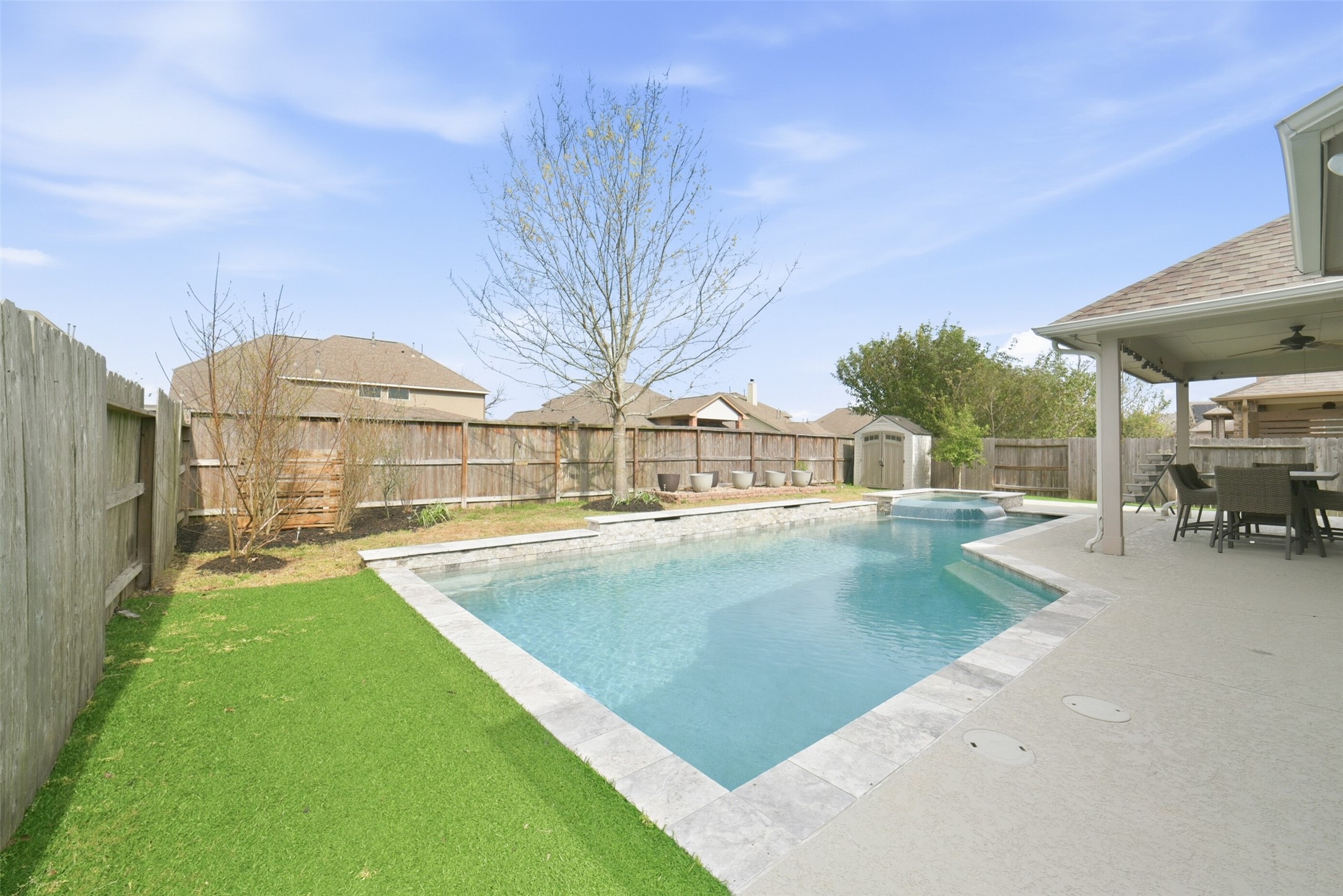 30014 Valley Terrace Drive Fulshear, TX 77406 - Photo 33 of 36 There is a water fountain feature and infinity edge spa.