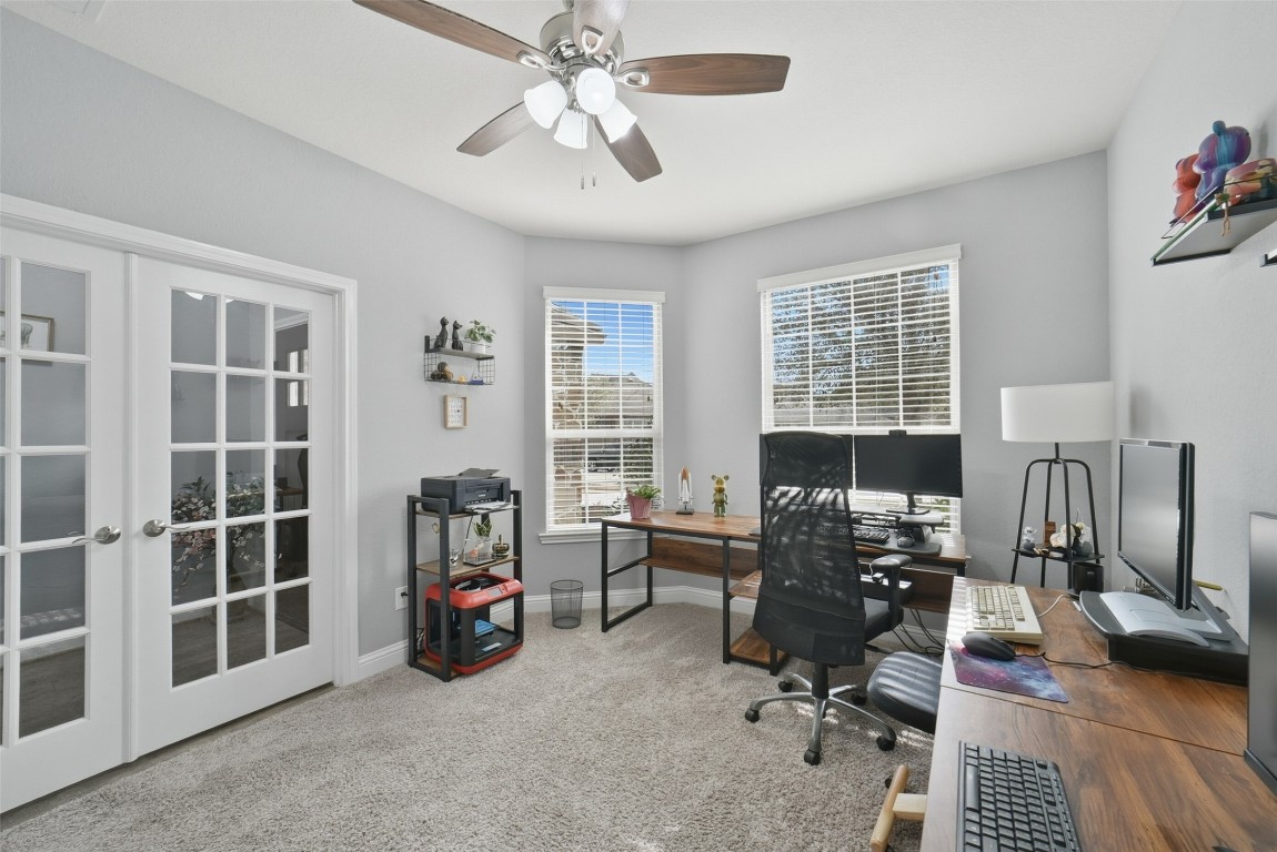 30014 Valley Terrace Drive Fulshear, TX 77406 - Photo 6 of 35 a view of a livingroom with workspace and a window