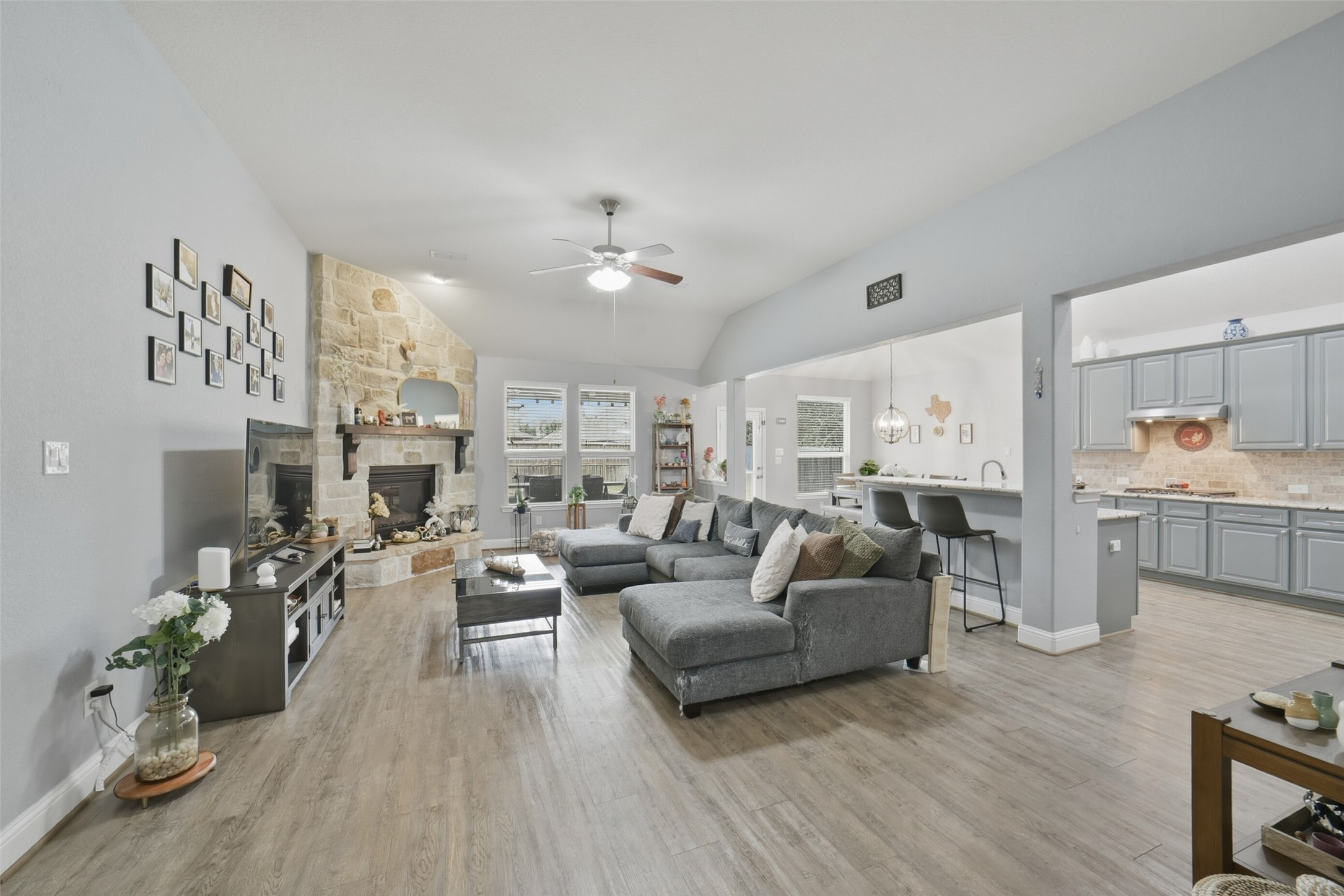 30014 Valley Terrace Drive Fulshear, TX 77406 - Photo 10 of 36 As you walk out the formal dining room further down the hall wall you will eventually walk into the family room. From this angle you can see there is a nice open concept feel in this beautiful home!