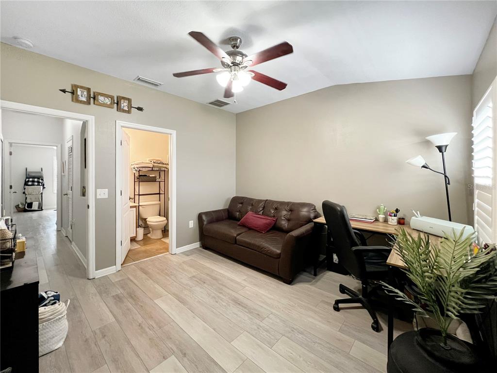 15767 Stable Run Drive Spring Hill, FL 34610 - Photo 27 of 34 a living room with furniture