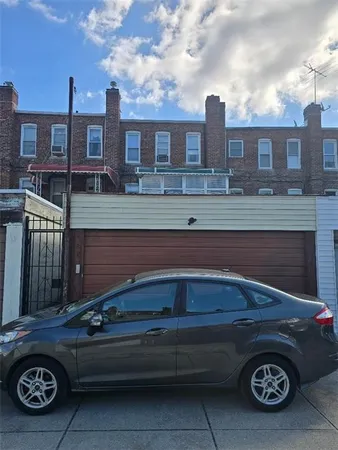 a car parked in front of a building