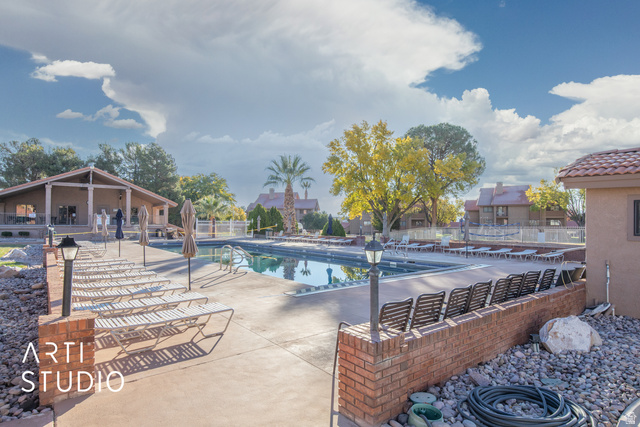 860 South Village Road, Unit A6 St. George, UT 84770 - Photo 30 of 41 Community pool with a patio