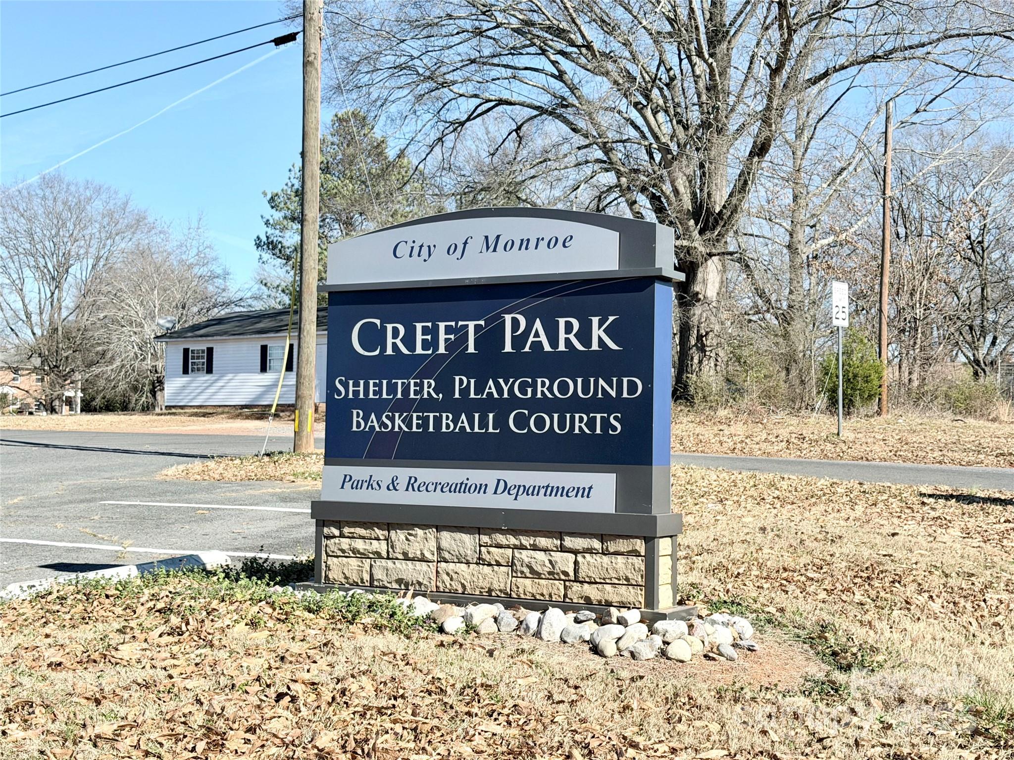 Tbd John Street, Unit 2 3 4 Monroe, NC 28110 - Photo 5 of 9 a sign on the side of a building