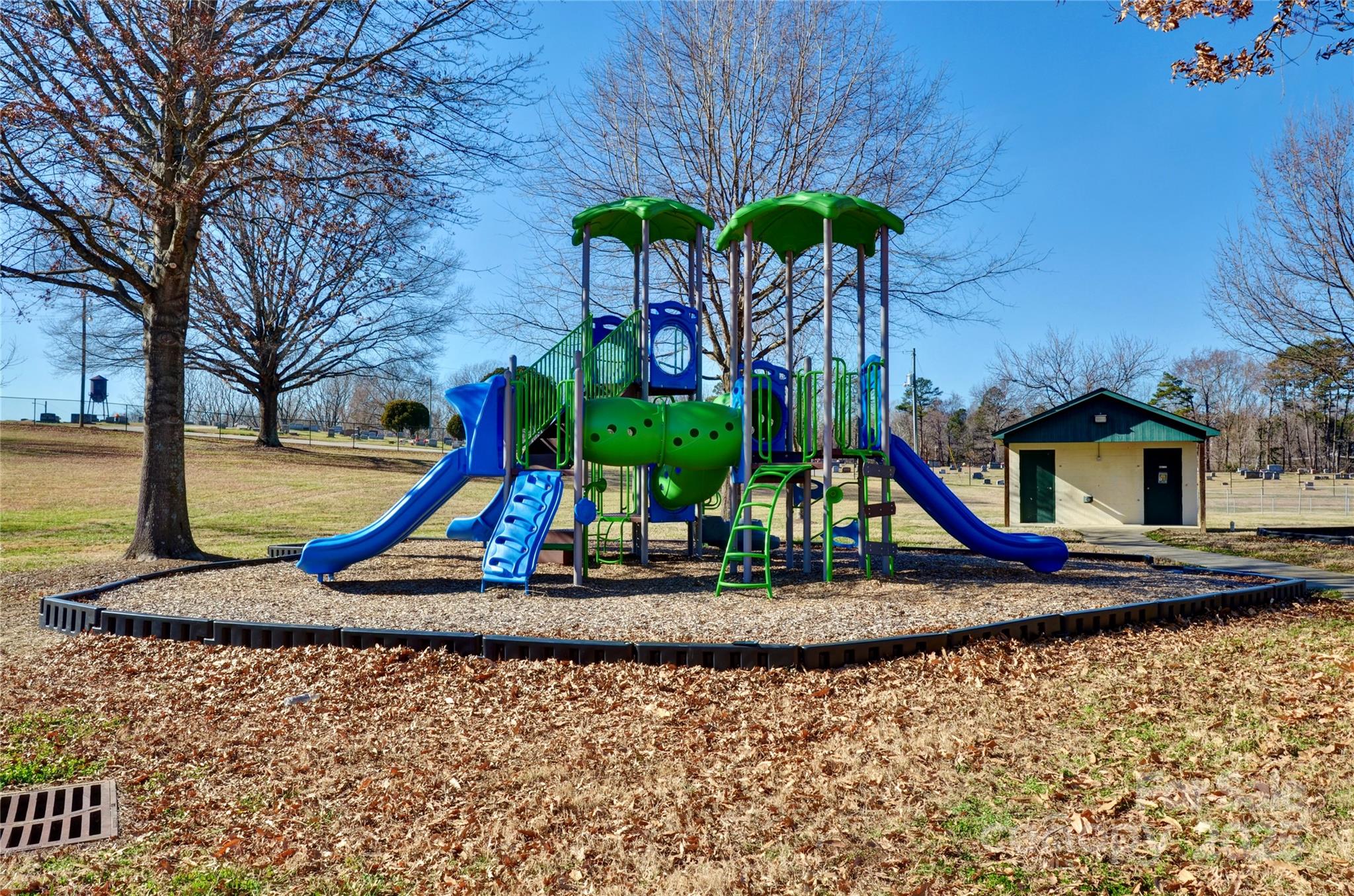 Tbd John Street, Unit 2 3 4 Monroe, NC 28110 - Photo 6 of 9 a view of a house with a park