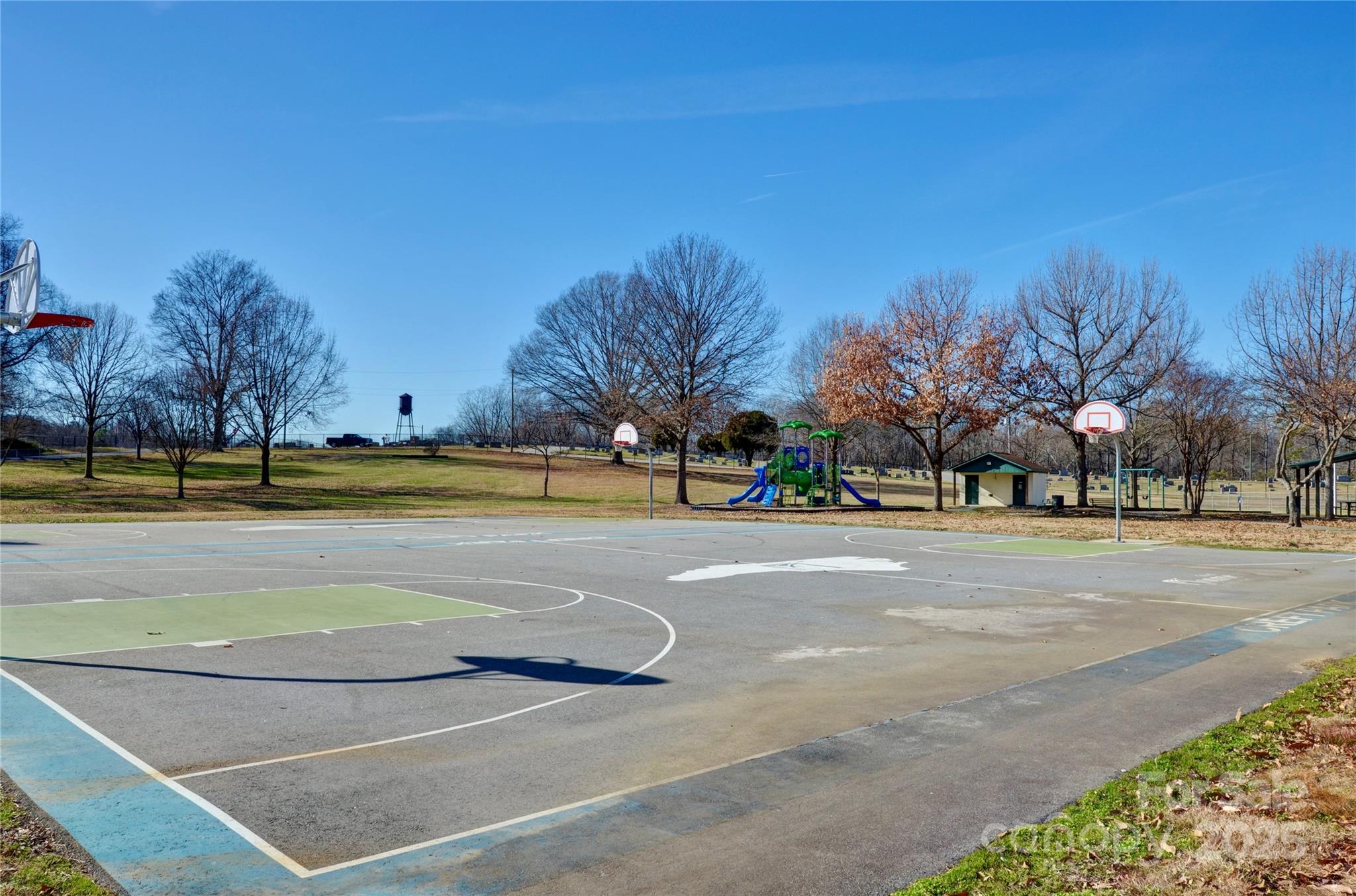 Tbd John Street, Unit 2 3 4 Monroe, NC 28110 - Photo 7 of 9 a view of a swimming pool with an outdoor space and seating area