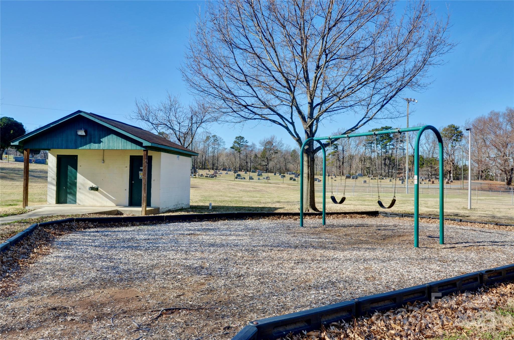 Tbd John Street, Unit 2 3 4 Monroe, NC 28110 - Photo 8 of 9 a view of a house with a yard