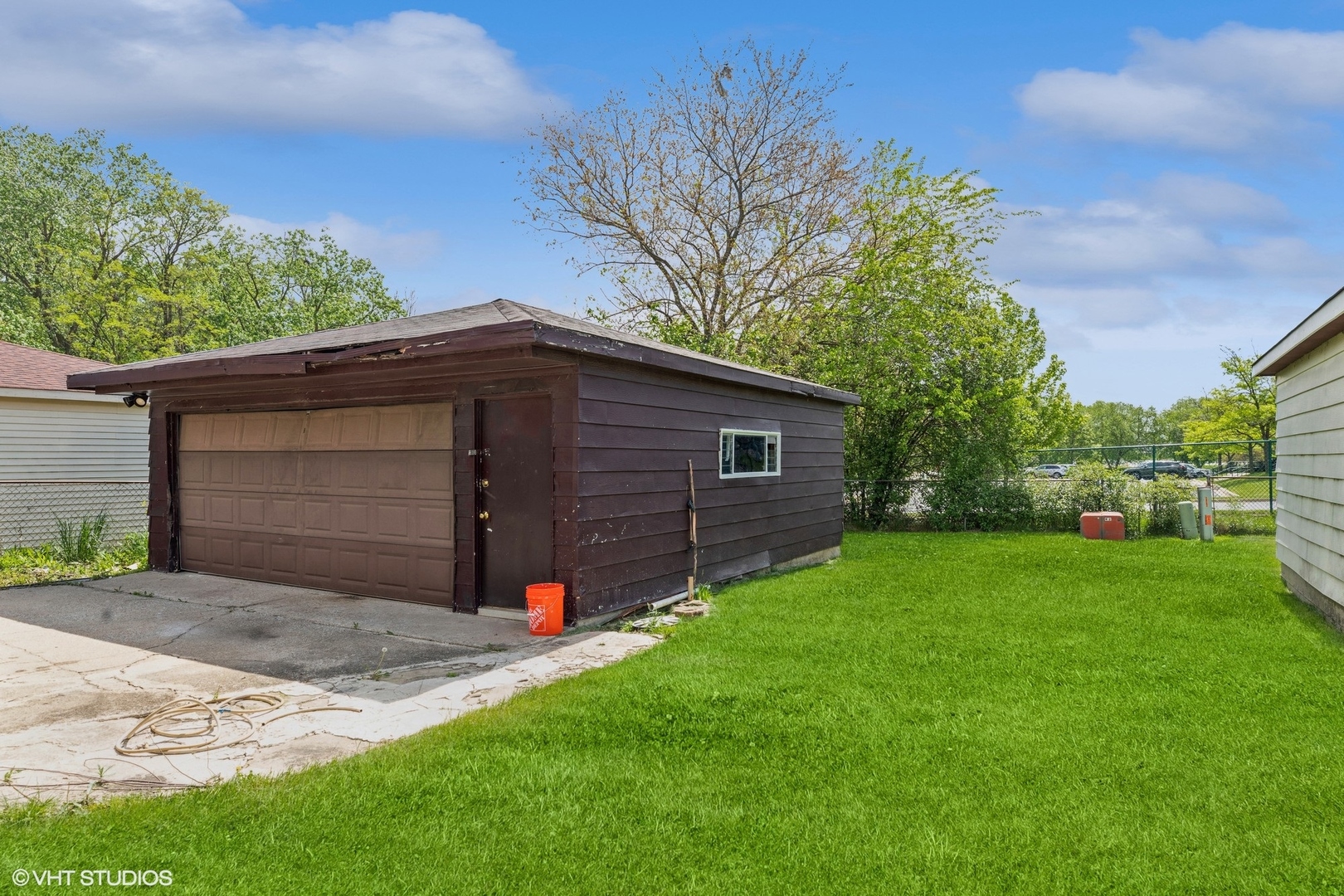 18159 Ravisloe Terrace Country Club Hills, IL 60478 - Photo 15 of 19 a view of a back yard of the house