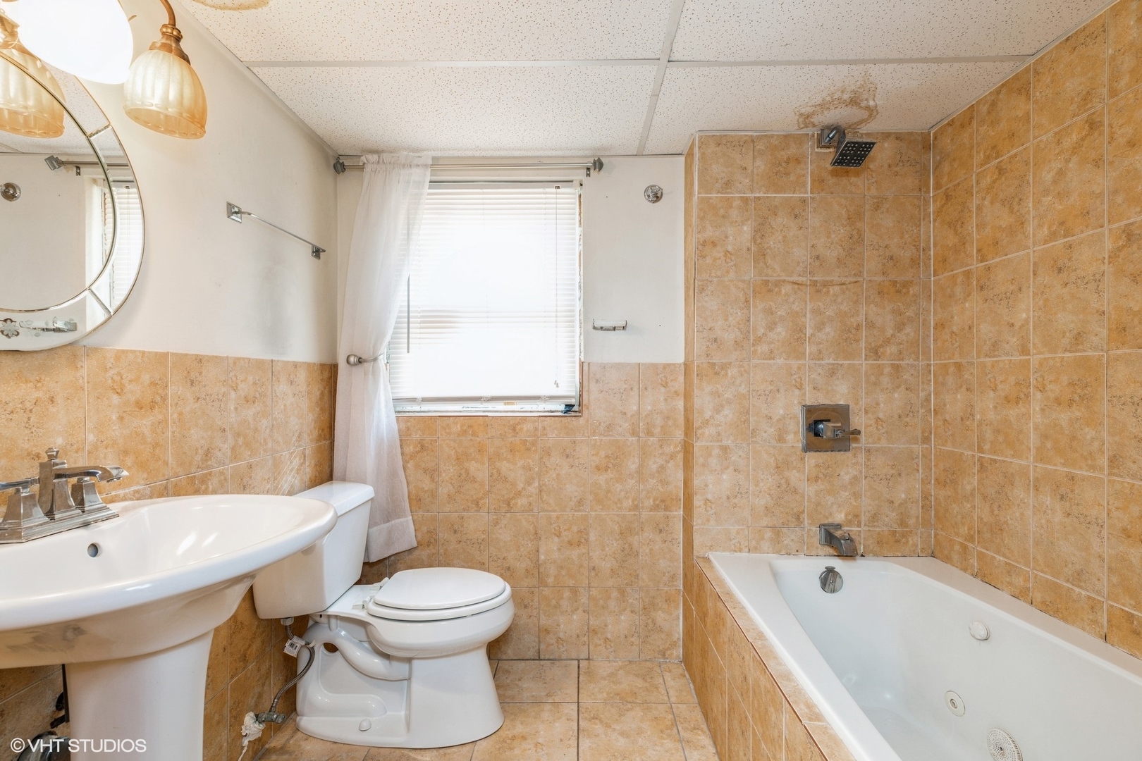 18159 Ravisloe Terrace Country Club Hills, IL 60478 - Photo 10 of 19 a bathroom with a sink a toilet and shower