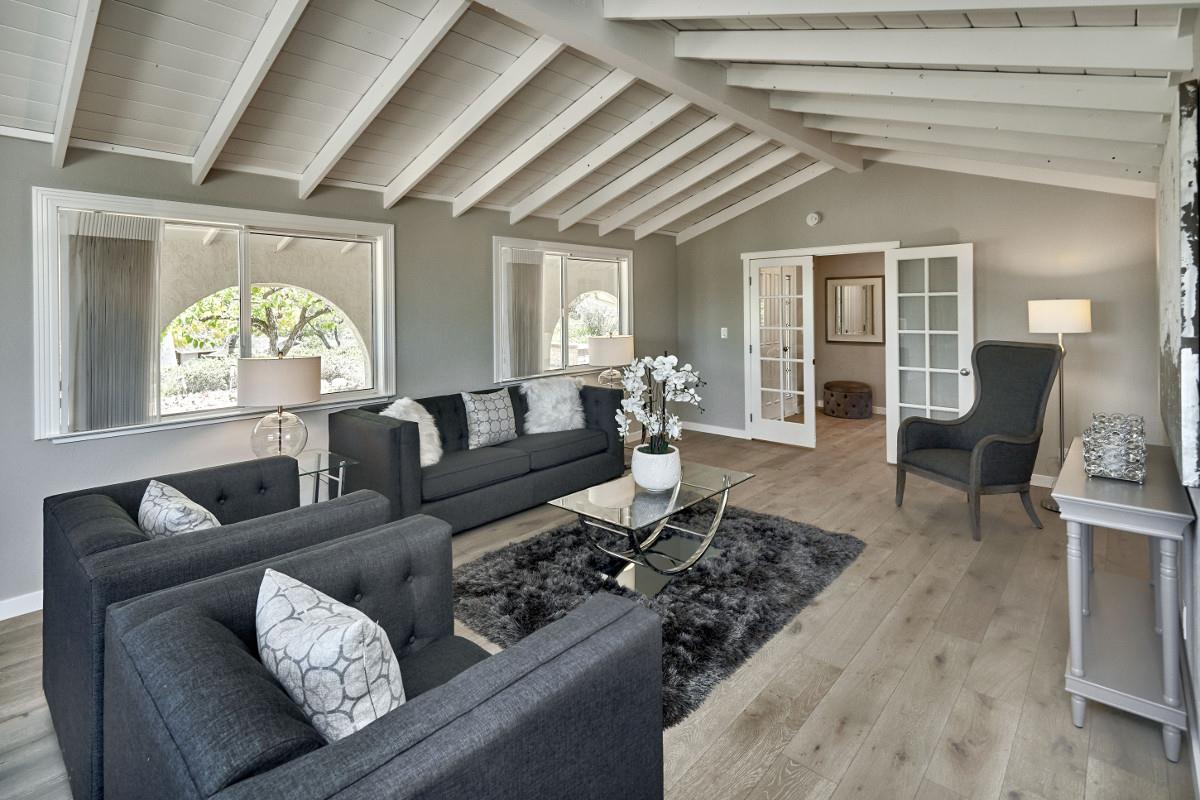20421 Hunter's Hill Road San Jose, CA 95120 - Photo 15 of 50 a living room with furniture and a large window