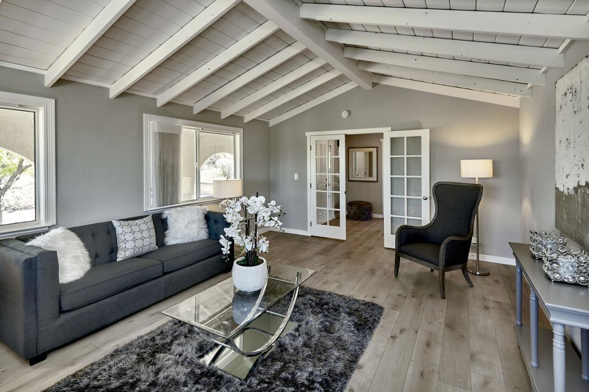 20421 Hunter's Hill Road San Jose, CA 95120 - Photo 16 of 50 a living room with furniture and wooden floor