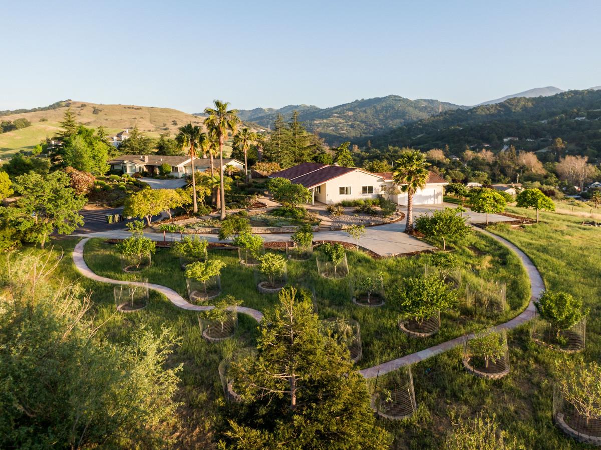 20421 Hunter's Hill Road San Jose, CA 95120 - Photo 2 of 50 a view of a town with mountains in the background