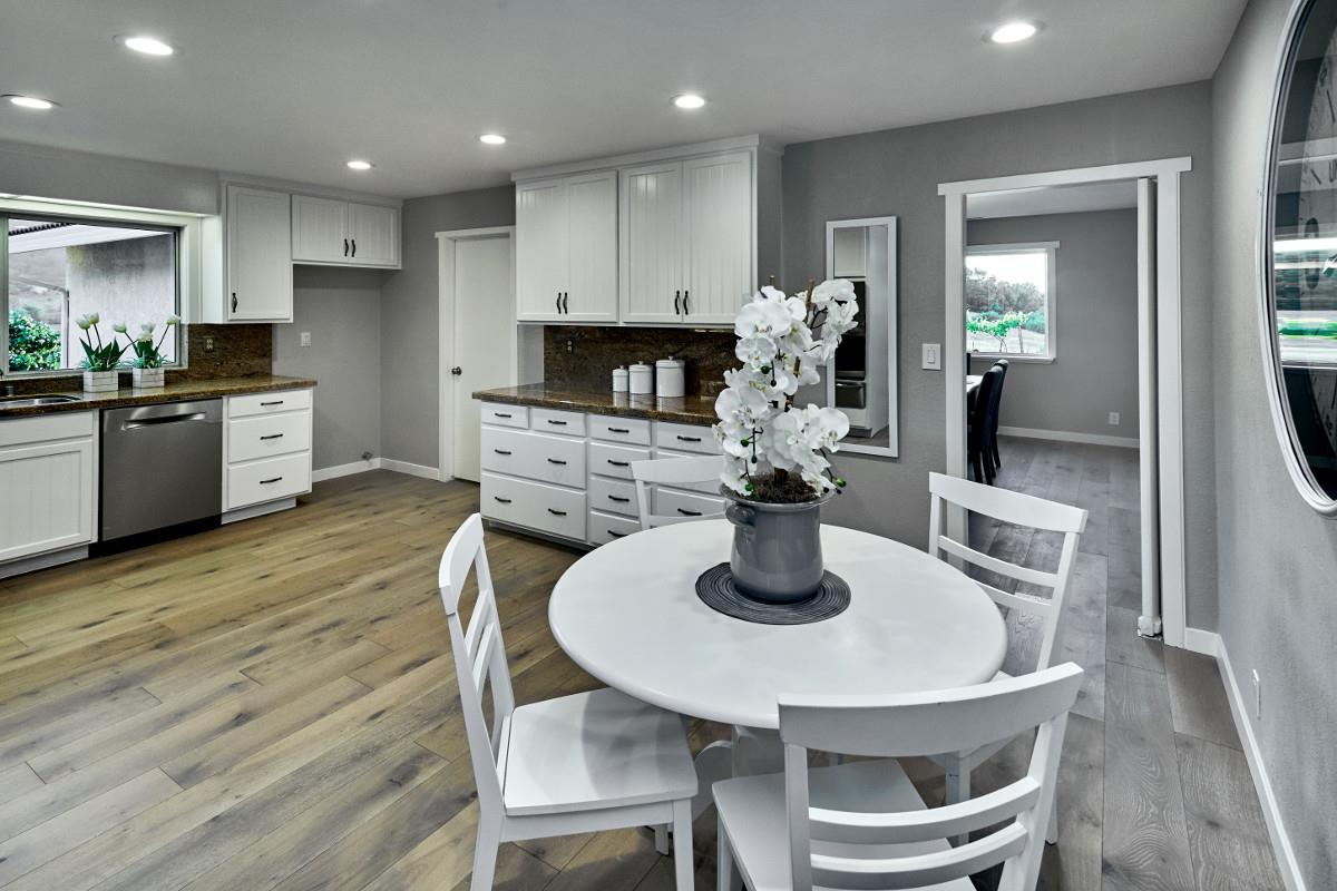 20421 Hunter's Hill Road San Jose, CA 95120 - Photo 22 of 50 a kitchen with a table and chairs in it