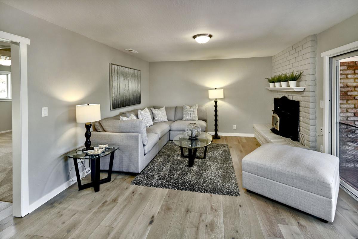 20421 Hunter's Hill Road San Jose, CA 95120 - Photo 25 of 50 a living room with furniture and a lamp