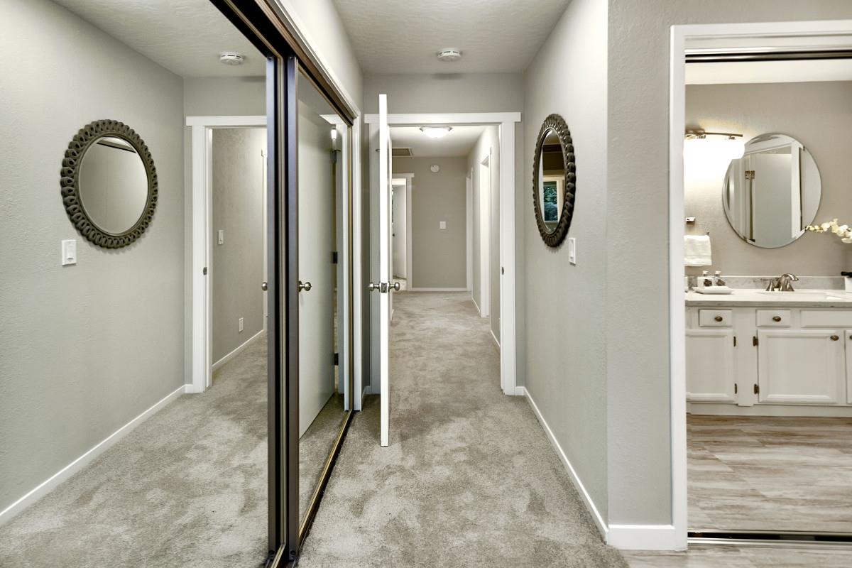 20421 Hunter's Hill Road San Jose, CA 95120 - Photo 30 of 50 a bathroom with mirror and shower