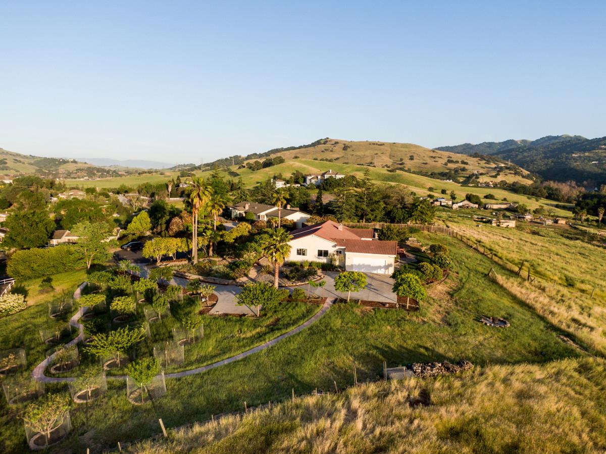 20421 Hunter's Hill Road San Jose, CA 95120 - Photo 3 of 50 an aerial view of residential houses with outdoor space