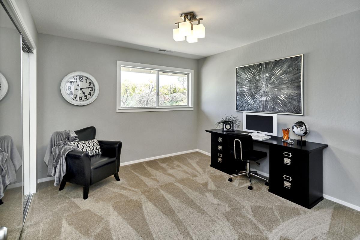 20421 Hunter's Hill Road San Jose, CA 95120 - Photo 35 of 50 a living room with furniture and a window