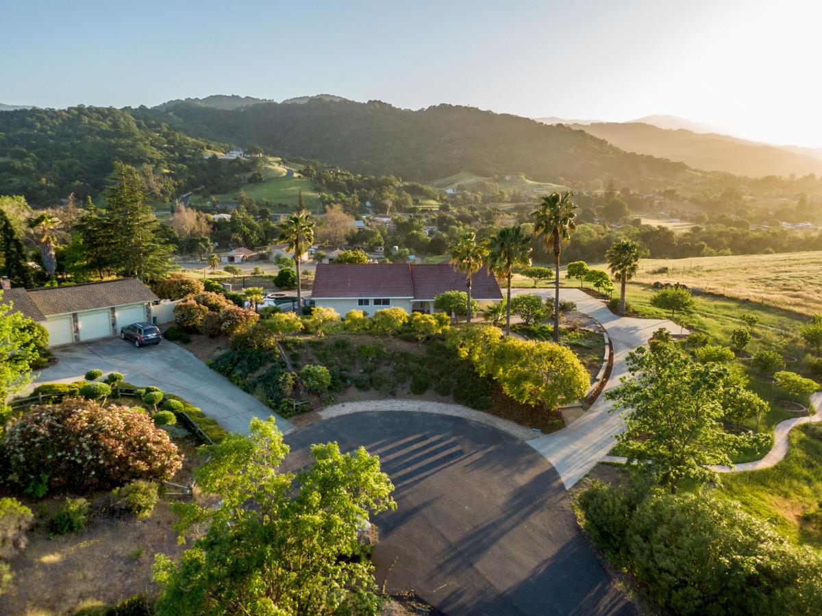 20421 Hunter's Hill Road San Jose, CA 95120 - Photo 4 of 50 a view of a city with mountains in the background