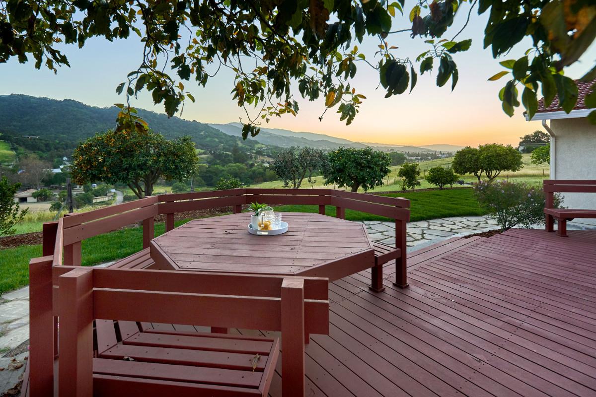 20421 Hunter's Hill Road San Jose, CA 95120 - Photo 44 of 50 a view of a chairs and table on the wooden deck