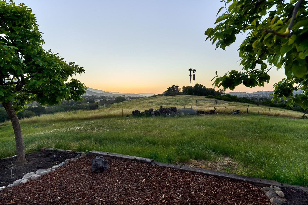 20421 Hunter's Hill Road San Jose, CA 95120 - Photo 46 of 50 a front view of a house with a yard