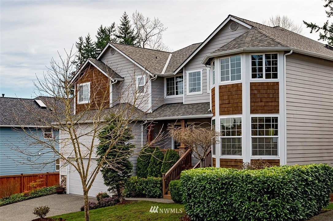 2114 241st Street Southwest Bothell, WA 98021 - Photo 1 of 32 a view of a yard in front of a house