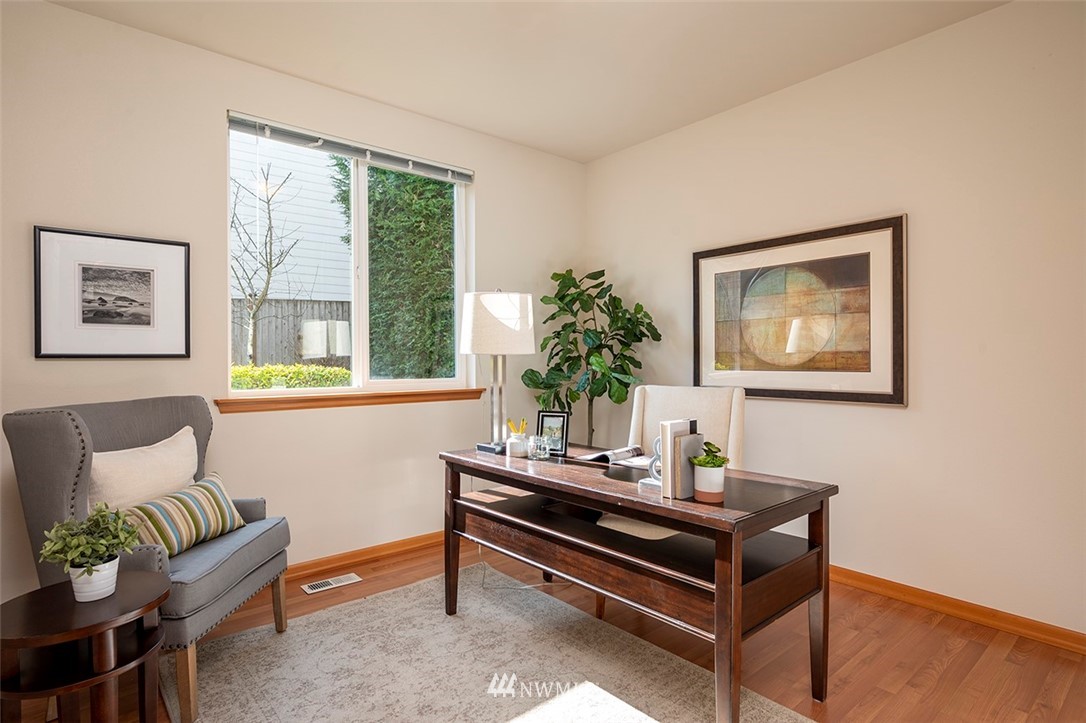 2114 241st Street Southwest Bothell, WA 98021 - Photo 11 of 32 a living room with furniture and a potted plant