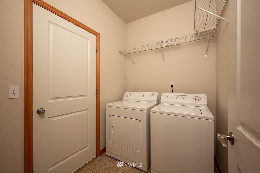 2114 241st Street Southwest Bothell, WA 98021 - Photo 13 of 32 a utility room with dryer and washer