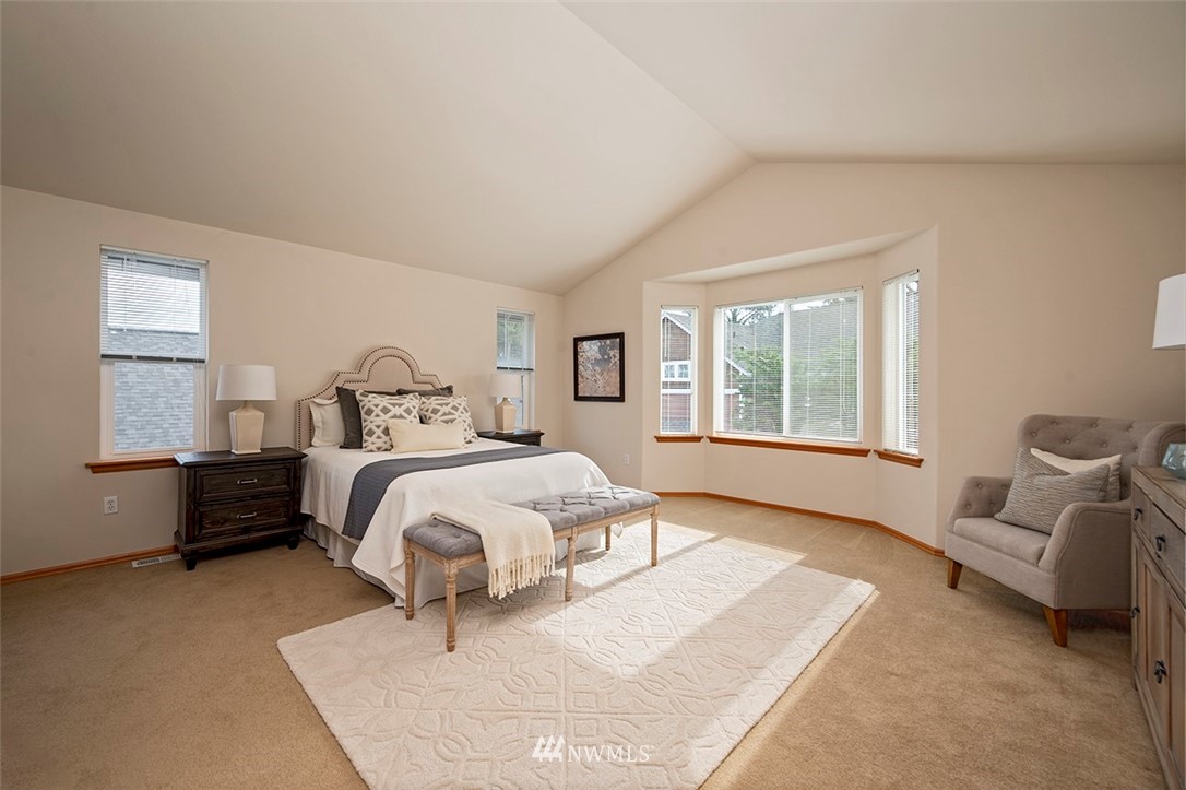 2114 241st Street Southwest Bothell, WA 98021 - Photo 16 of 32 a bedroom with a bed and window