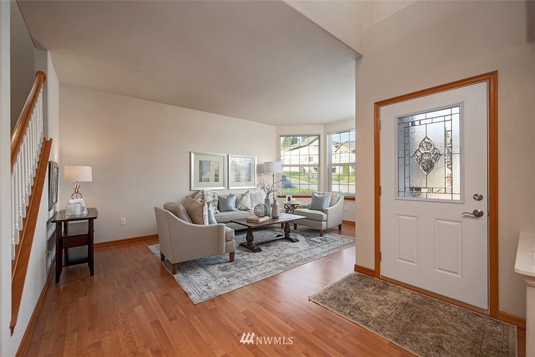2114 241st Street Southwest Bothell, WA 98021 - Photo 3 of 32 a living room with furniture and a window