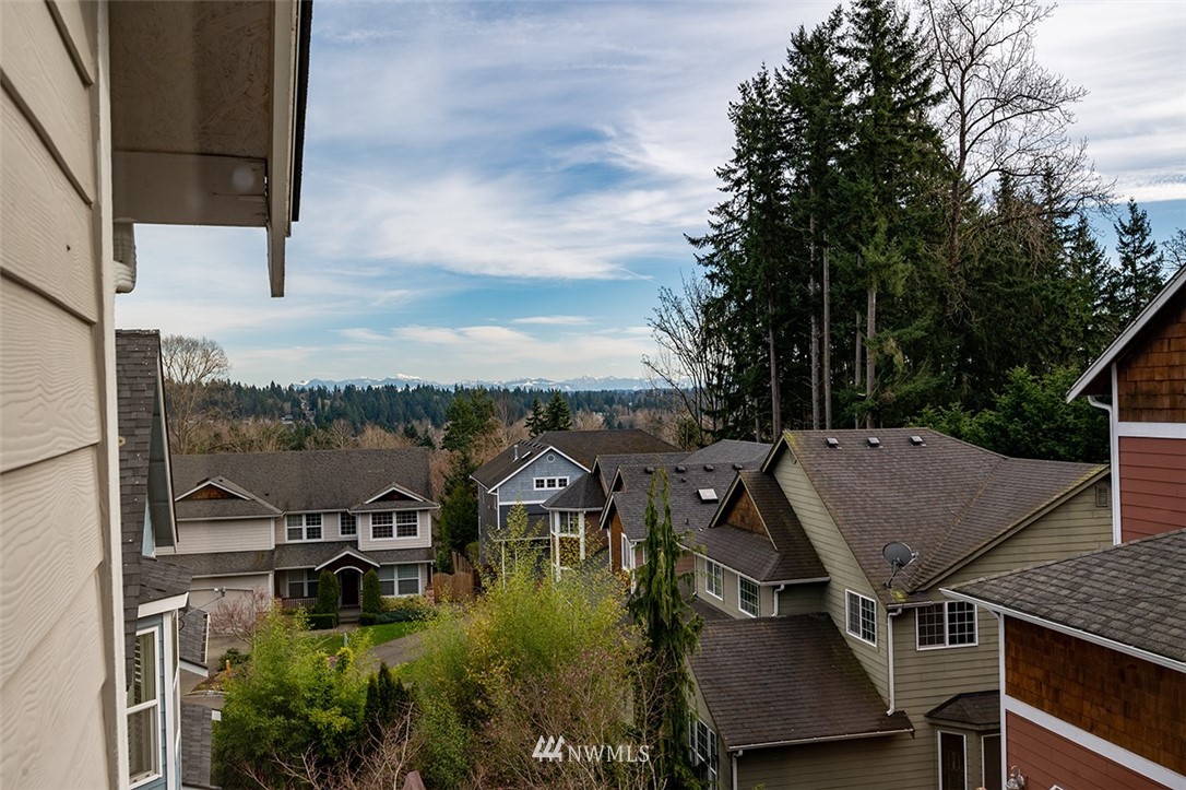 2114 241st Street Southwest Bothell, WA 98021 - Photo 26 of 32 an aerial view of residential houses with outdoor space and parking