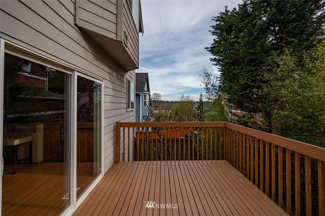 2114 241st Street Southwest Bothell, WA 98021 - Photo 30 of 32 a balcony with wooden floor