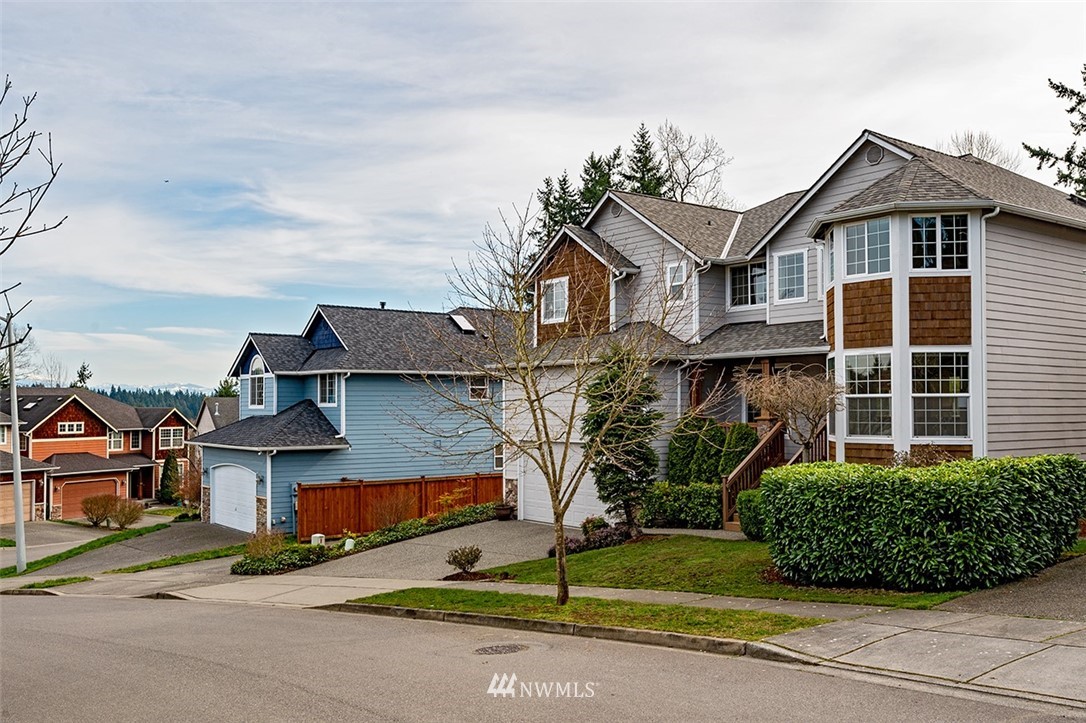2114 241st Street Southwest Bothell, WA 98021 - Photo 32 of 32 front view of a house with a street